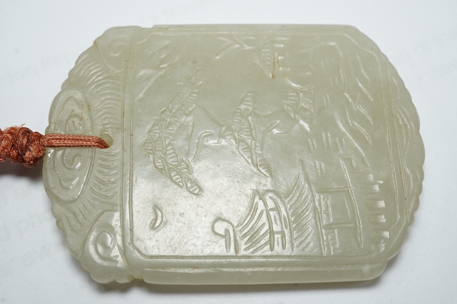 An unusual Chinese pale celadon jade plaque, 19th century